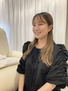 ひとりでも多くの人にまつ毛パーマの魅力を体感してほしいと笑顔で語る加藤さん
