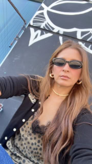 ドイツのブランド、MIKUTAのヒョウ柄のレースキャミはさらっとカーデに合わせて。