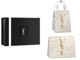 左：有料ボックスには、ホリデー限定の特別なリボンつき。右上：ノエル ギフト バッグ ￥550 右下：ノエル リップバッグ ￥110