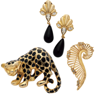 インパクトのあるレオパードのブローチ「ファインジュエリーとヴィンテージジュエリーを組み合わせたスタイルが好き。今季は特にイヤリングやブローチに注目しています。存在感のあるユニークなデザインはシンプルな着こなしのポイントに」ヴィンテージジュエリーは全て本人私物