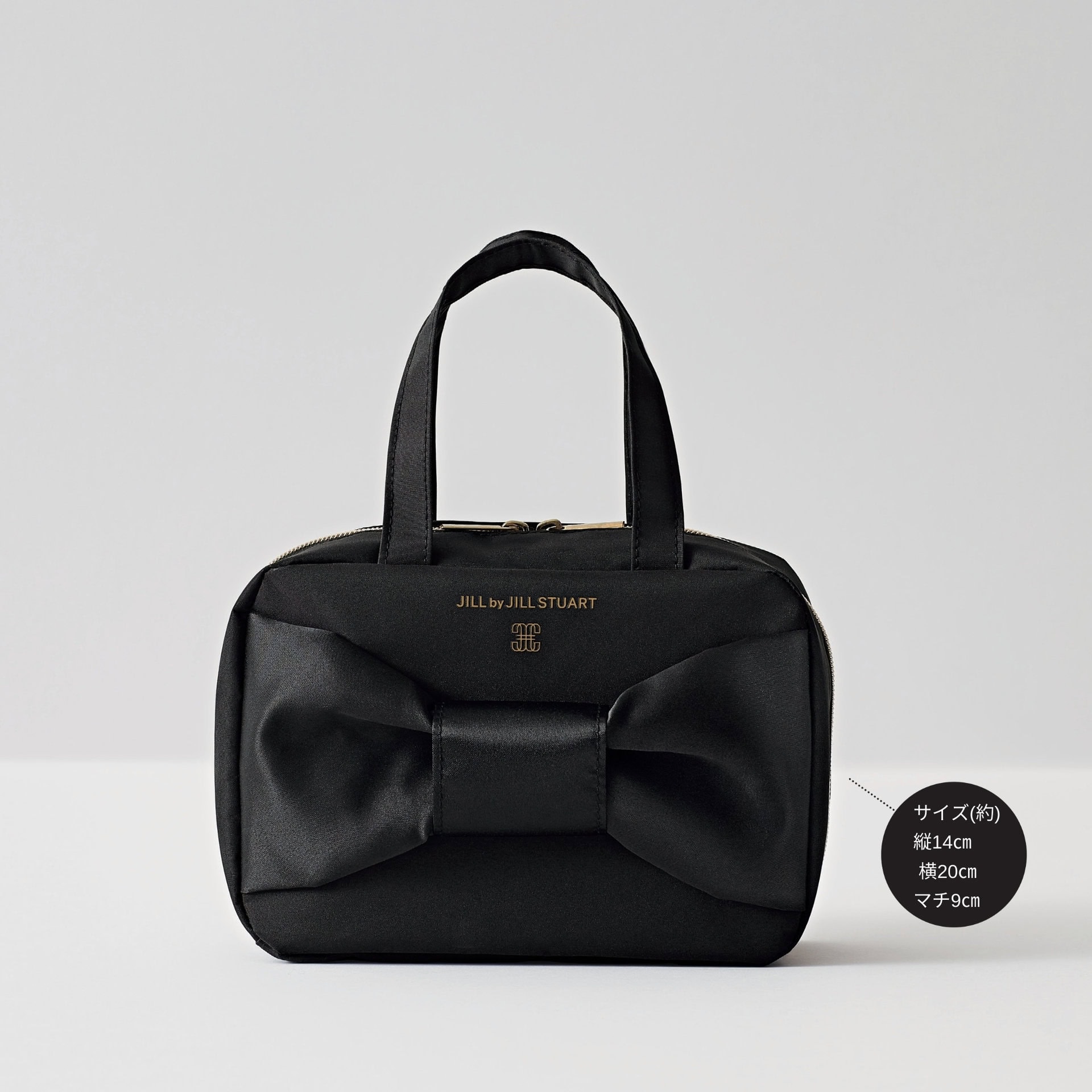 上品なブラック×ビッグリボンがポイント。バッグとしてもポーチとしても使える。