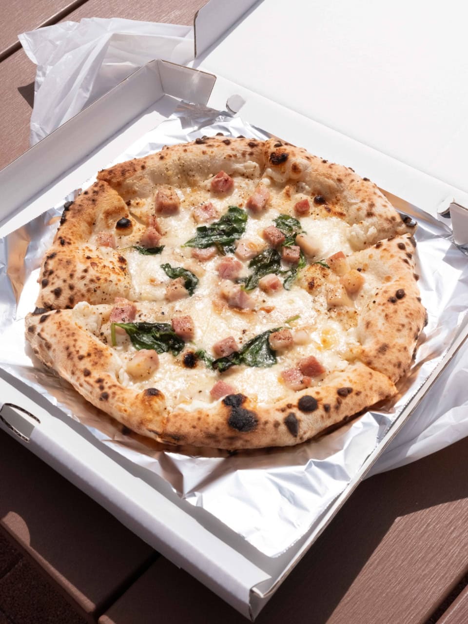 リコッタチーズや燻製モッツアレラを使ったプレジデンテの定番ピッツァ。プレジデンテ￥2,000